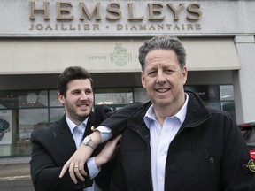 Richard Hennick, right, and his son Jordan pose outside their Hemsleys store as the business celebrates its 150th anniversary. The pandemic put a damper on the celebrations, but business is steady now.
