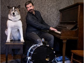 Damien Robitaille and his dog Suki are seen on Thursday, Dec. 3, 2020.