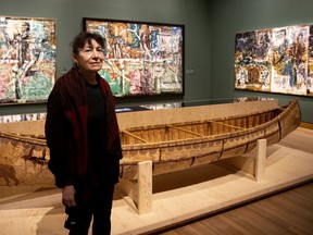Yseult Riopelle, daughter of Jean Paul Riopelle, in front of a canoe made for her father by Atikamekw artisan Cesar Newashish at the Montreal Museum of Fine Arts.