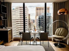 Romantic and responsible, the In-Room Gastronomy Staycation at Hôtel Le Germain Montréal includes a room with a view, dinner served privately with wine, and valet parking.