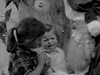 Crying on Santa’s knee in the NFB’s “Days Before Christmas.”