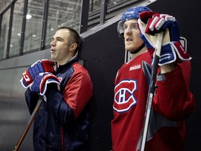 Canadiens sports science and performance director  Pierre Allard, left, with winger Dale Weise at the Bell Sports Complex in Brossard on Jan. 4, 2016.