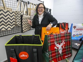 Sylvia Feldzamen with antimicrobial shopping bags in the showroom of her business in Dollard-des-Ormeaux.