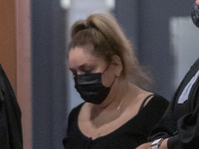 Phoebe Greenberg says her former assistant Sandra Testa, pictured at the Montreal courthouse on Dec. 10, was never authorized to make a number of expensive purchases.