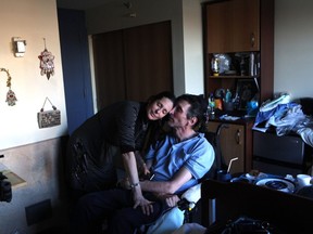 Rabbi Ronnie Cahana, with wife Karen Knie-Cahana in his room at Maimonides before the pandemic, says to receive the vaccine is to fulfil a spiritual duty.