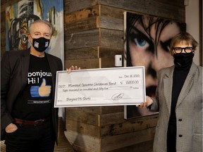 CJAD host Aaron Rand raised more than $8,000 for the Christmas Fund selling bonjour-hi T-shirts this fall. Rand presented the cheque to Gazette Editor-in-Chief Lucinda Chodan on Thursday.