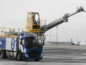 Electric de-icing truck takes two to six hours to fully charge and reduces CO2 emissions by 87 per cent. It is seen here at Trudeau airport in Montreal on Thursday, Dec. 17, 2020.