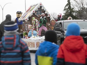 Kids enjoy the magical holiday parade hosted by Dollard-des-Ormeaux last Sunday. Due to the COVID-19 pandemic, participants were asked to wear a mask and to respect social distancing. During the event, the city collected non-perishable food items for the West Island Assistance Fund.