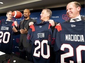 Mario Cecchini, president of the Montreal Alouettes, from left, head coach Khari Jones, co-owner Gary Stern and general manager Danny Maciocia in Montreal on Jan. 13, 2020.