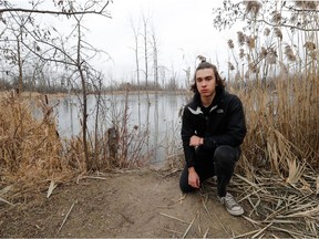Julien Bourdeau, 17, seen here in the Technoparc wetlands, is petitioning the city to ban rodenticides — as has been done in Vancouver and California. Rodents like field mice eat the poison and die over the next couple of days and are then eaten by predators like hawks who subsequently become poisoned themselves.