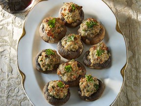 The Official Downton Abbey Christmas Cookbook adds some upper-crust class to your holidays with beautifully illustrated recipes, including stuffed mushrooms.
