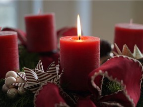 A candle lit by the photographer's wife on an Advent wreath she made stands on the first day of Advent during the coronavirus pandemic on November 29, 2020 in Berlin, Germany.