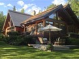 This imposing six-bedroom home at 802 Chemin des Skieurs is nestled on three mountainside acres overlooking Lac Tremblant.
