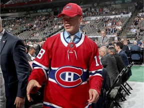 Jordan Harris reacts after being selected 71st overall by the Montreal Canadiens during the 2018 NHL Draft at American Airlines Center on June 23, 2018 in Dallas.