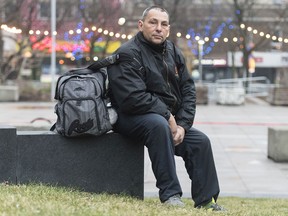 Sylvain Di Lallo poses for a portrait outside Hotel Place Dupuis in Montreal, Saturday, Dec. 5, 2020. Shelter workers and experts all agree that the pandemic has made homelessness more visible and disrupted the way people access both formal and informal services.