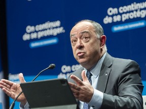 Quebec Health Minister Christian Dube speaks to the media at a COVID-19 briefing Monday, December 7, 2020  in Montreal.