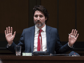 Prime Minister Justin Trudeau responds to a question during a year end interview with The Canadian Press in Ottawa, Wednesday December 16, 2020.