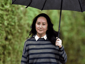 Huawei Technologies Chief Financial Officer Meng Wanzhou leaves her home to attend a court hearing in Vancouver on Nov. 23, 2020.
