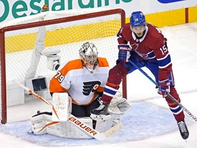 Montreal Canadiens centre Jesperi Kotkaniemi screens Philadelphia Flyers' Carter Hart during Game 5 of playoff series at Rogers Place in Edmonton on Aug. 18, 2020.