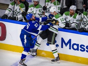 Tampa Bay Lightning defenceman Ryan McDonagh checks Dallas Stars right-winger Corey Perry in Game 2 of the 2020 Stanley Cup Final at Rogers Place in Edmonton on Sept. 21, 2020.