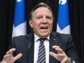 "Santé Publique tells us that if it's in your yard when it starts to get cold, it's easy to go to the bathroom, to go grab a drink,” Premier François Legault says. "I think there's less risk in a public place than in a private yard."
