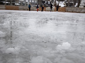 A family attempts to skate on a small section of the Dixie Park rink that is frozen and reasonably flat. The family said the city appears to have installed the boards and never came back to work on the ice.