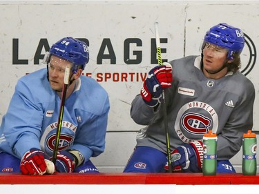 Newcomers, from left, Corey Perry and Tyler Toffoli on the bench during Montreal Canadiens training camp practice at the Bell Sports Complex in Brossard on Tuesday Jan. 5, 2021.