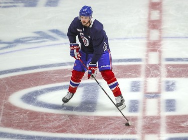 Newcomer Joel Edmundson skates across the Habs logo during Montreal Canadiens training camp practice at the Bell Sports Complex in Brossard on Tuesday Jan. 5, 2021.