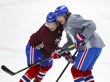 Tyler Toffoli, right, leans on Jake Evans during Montreal Canadiens training camp practice at the Bell Sports Complex in Brossard on Wednesday, January 6, 2021.  (John Mahoney} / MONTREAL GAZETTE) ORG XMIT: 65563 - 2491