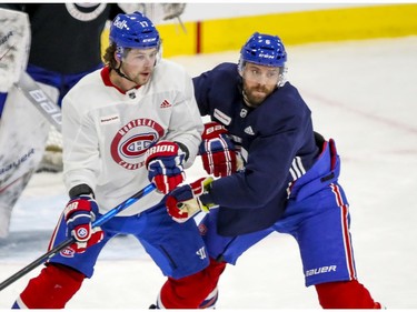 Josh Anderson, left, bumps with Shea Weber during Montreal Canadiens training camp practice at the Bell Sports Complex in Brossard on Wednesday, January 6, 2021.