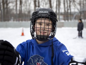 Brian Barnfield, 11, said he was happy to skate and pass the puck on the rink at Heights Park in Beaconsfield on Monday. He said it was the first time he was able to have a hockey stick on a local outdoor ice rink in almost a month.