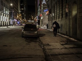 A homeless man walks on Metcalfe St. on Saturday, January 9, 2021 in Montreal.