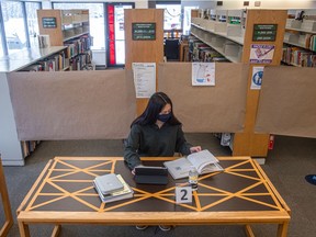 Grade 11 Royal West Academy student Magali Shimotakahara is seen at the Pointe-Claire Public Library on Tuesday, Jan. 12, 2021.