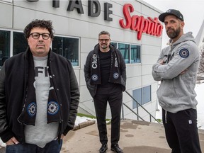 Kevin Gilmore, president and CEO, centre, with creative co-directors Paul Labonte, left, and Justin Kingsley at Stade Saputo on  Jan. 14, 2021. The club has rebranded the team as Club de Foot Montréal.