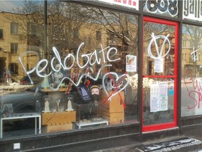 The graffiti that was spray-painted on the windows of the BBAM! Gallery references a baseless conspiracy theory affiliated with the QAnon movement.