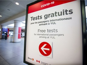 Sign giving directions for free COVID-19 tests at Montréal–Trudeau International Airport Tuesday January 26, 2021. (John Mahoney / MONTREAL GAZETTE) ORG XMIT: 65664 - 6737