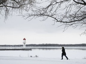 A woman uses her cross-country skis for a little outing along in Lachine on Jan. 27, 2021.