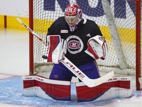 Carey Price makes a blocker save during Montreal Canadiens practice at the Bell Sports Complex in Brossard on Jan. 27, 2021.