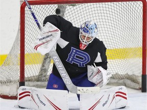Laval Rocket goalie Michael McNiven makes a save during practice last season at Place Bell in Laval.