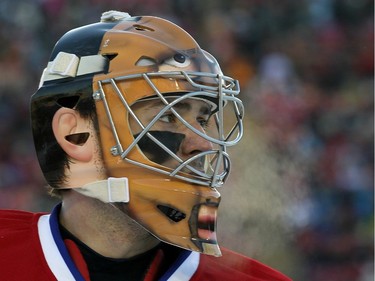 Carey Price #31 of the Montreal Canadiens takes a break in his game against the Calgary Flames during the 2011 NHL Heritage Classic Game at McMahon Stadium on February 20, 2011 in Calgary, Alberta, Canada.