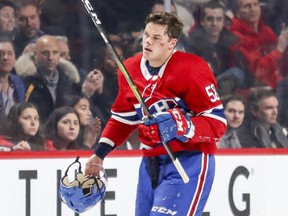 Canadiens defenceman Noah Juulsen heads to the bench after taking a puck to the face during game against the Washington Capitals at the Bell Centre on Nov. 19, 2018.