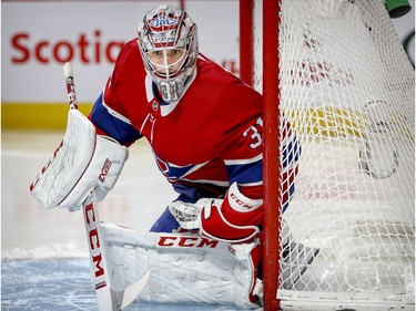 Carey Price tracks the puck during second period of National Hockey League game against the Boston Bruins in Montreal Monday, December 17, 2018.