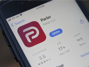 A view of the Parler app icon displayed on an iPhone on Saturday, Jan. 9, 2021, in London, England. The Parler App popular with right-wing supporters has been suspended from the Apple App Store and Google's Play store over continued postings by users that incite violence. U.S. President Donald Trump was suspended indefinitely from Twitter after tweets he made encouraged his supporters to break into the Capitol building and five people died in the ensuing violence.
