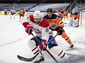 Oilers' Kyle Turris skates against Canadiens' Tomas Tata at Rogers Place on Saturday, Jan. 16, 2021, in Edmonton.