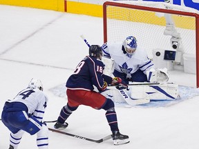 Pierre-Luc Dubois of the Columbus Blue Jackets scores the winning goal past Frederik Andersen of the Toronto Maple Leafs during the first overtime period to win Game 3 of the Eastern Conference Qualification Round prior to the 2020 NHL Stanley Cup Playoffs at Scotiabank Arena on Aug. 6, 2020, in Toronto.