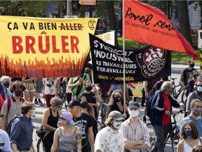 People march on René-Lévesque Blvd. in Montreal to protest against the lack of action on climate change, on Saturday, Sept. 26, 2020.