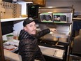 Pat Dogniaux inside the Pizzeria Bros mobile pizza kitchen.