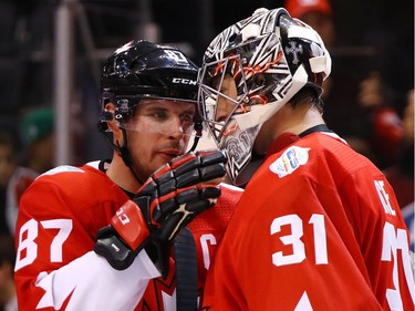 Carey Price #31 of Team Canada is congratulated by Sidney Crosby #87 after their team defeated Team Europe during Game One of the World Cup of Hockey final series at Air Canada Centre on September 27, 2016 in Toronto, Canada. Team Canada defeated Team Europe 3-1.