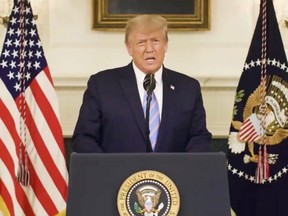U.S President Donald Trump gives an address, a day after his supporters stormed the U.S. Capitol in Washington, D.C., in this still image taken from video provided on social media on Jan. 8, 2021.