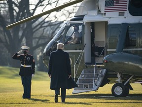 President Donald Trump boards Marine One on the South Lawn of the White House on Jan. 12, 2021, in Washington, D.C.
